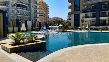 Меблированная квартира 1+1 в престижном комплексе Махмутлара. До моря 650 м. - Ракурс 4