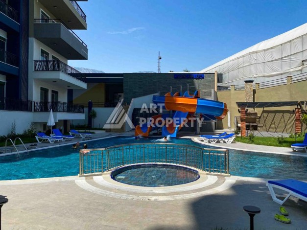 Меблированная квартира 1+1 в престижном комплексе Махмутлара. До моря 650 м. - Ракурс 4