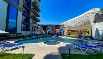 Меблированная квартира 1+1 в престижном комплексе Махмутлара. До моря 650 м. - Ракурс 6