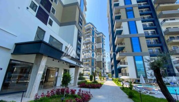 Меблированная квартира 1+1 в престижном комплексе Махмутлара. До моря 650 м. - Ракурс 7