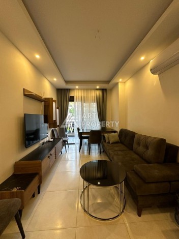 Меблированная квартира 1+1 в престижном комплексе Махмутлара. До моря 650 м. - Ракурс 26