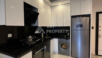 Меблированная квартира 1+1 в престижном комплексе Махмутлара. До моря 650 м. - Ракурс 35