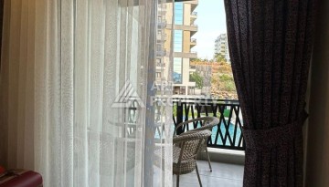 Меблированная квартира 1+1 в престижном комплексе Махмутлара. До моря 650 м. - Ракурс 37