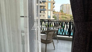 Меблированная квартира 1+1 в престижном комплексе Махмутлара. До моря 650 м. - Ракурс 38