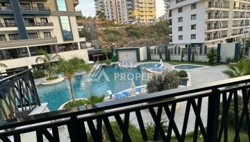 Меблированная квартира 1+1 в престижном комплексе Махмутлара. До моря 650 м. - Ракурс 39