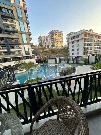 Меблированная квартира 1+1 в престижном комплексе Махмутлара. До моря 650 м. - Ракурс 38