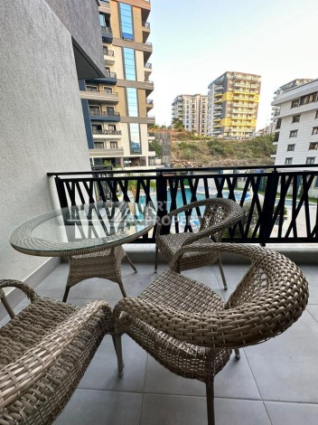 Меблированная квартира 1+1 в престижном комплексе Махмутлара. До моря 650 м. - Ракурс 39