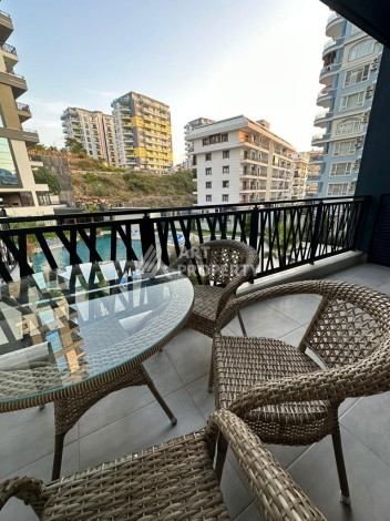 Меблированная квартира 1+1 в престижном комплексе Махмутлара. До моря 650 м. - Ракурс 40