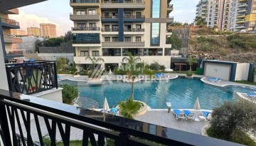 Меблированная квартира 1+1 в престижном комплексе Махмутлара. До моря 650 м. - Ракурс 42