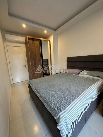 Меблированная квартира 1+1 в престижном комплексе Махмутлара. До моря 650 м. - Ракурс 44