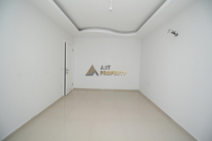 Большие по площади двухкомнатные апартаменты 1+1 в 300 метрах от моря, 60 м2 - Ракурс 9