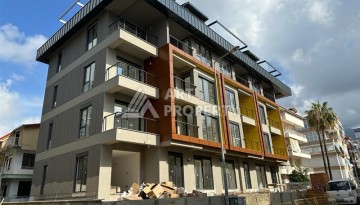 Современная квартира 2+1 в новом доме в районе пляжа Клеопатры, всего 370 метров от моря - Ракурс 1