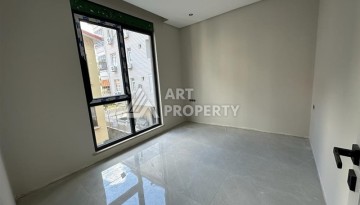 Современная квартира 2+1 в новом доме в районе пляжа Клеопатры, всего 370 метров от моря - Ракурс 7