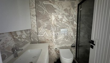 Современная квартира 2+1 в новом доме в районе пляжа Клеопатры, всего 370 метров от моря - Ракурс 9