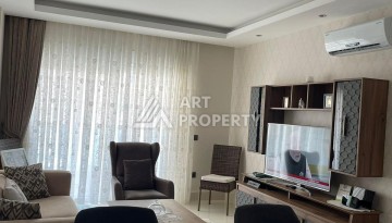 Стильная квартира 1+1 с видом на море в престижном комплексе района Тосмур, всего в 400 метрах от пляжа - Ракурс 3