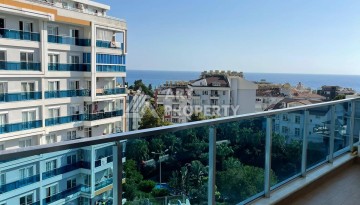 Стильная квартира 1+1 с видом на море в престижном комплексе района Тосмур, всего в 400 метрах от пляжа - Ракурс 6