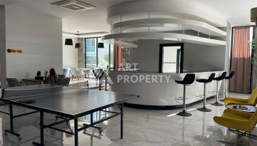 Стильная квартира 1+1 с видом на море в престижном комплексе района Тосмур, всего в 400 метрах от пляжа - Ракурс 7