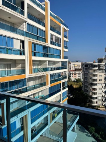 Стильная квартира 1+1 с видом на море в престижном комплексе района Тосмур, всего в 400 метрах от пляжа - Ракурс 7