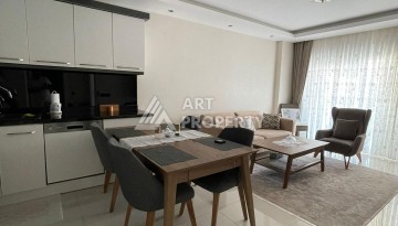 Стильная квартира 1+1 с видом на море в престижном комплексе района Тосмур, всего в 400 метрах от пляжа - Ракурс 9