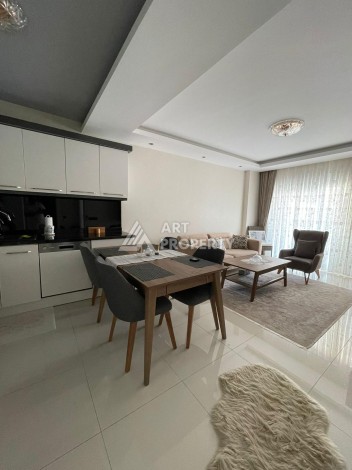 Стильная квартира 1+1 с видом на море в престижном комплексе района Тосмур, всего в 400 метрах от пляжа - Ракурс 8