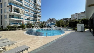 Стильная квартира 1+1 с видом на море в престижном комплексе района Тосмур, всего в 400 метрах от пляжа - Ракурс 10