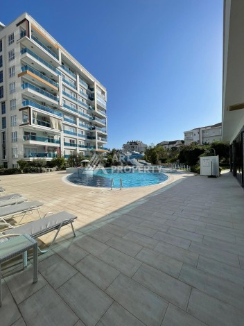 Стильная квартира 1+1 с видом на море в престижном комплексе района Тосмур, всего в 400 метрах от пляжа - Ракурс 9