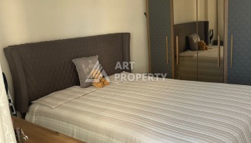 Стильная квартира 1+1 с видом на море в престижном комплексе района Тосмур, всего в 400 метрах от пляжа - Ракурс 14