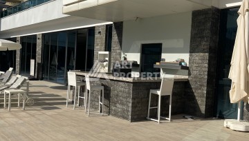 Стильная квартира 1+1 с видом на море в престижном комплексе района Тосмур, всего в 400 метрах от пляжа - Ракурс 20