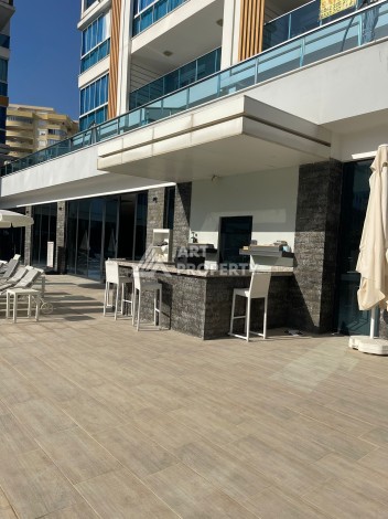 Стильная квартира 1+1 с видом на море в престижном комплексе района Тосмур, всего в 400 метрах от пляжа - Ракурс 19