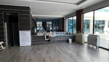 Стильная квартира 1+1 с видом на море в престижном комплексе района Тосмур, всего в 400 метрах от пляжа - Ракурс 28