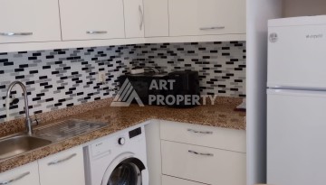 Квартира 1+1 с мебелью в районе Оба, всего в 250 метрах от моря — отличное предложение для жизни и инвестиций - Ракурс 2