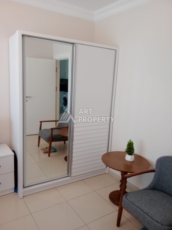 Квартира 1+1 с мебелью в районе Оба, всего в 250 метрах от моря — отличное предложение для жизни и инвестиций - Ракурс 3