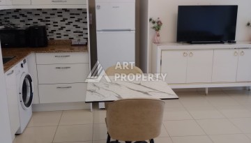 Квартира 1+1 с мебелью в районе Оба, всего в 250 метрах от моря — отличное предложение для жизни и инвестиций - Ракурс 6