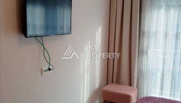 Квартира 1+1 с мебелью в районе Оба, всего в 250 метрах от моря — отличное предложение для жизни и инвестиций - Ракурс 14