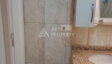 Квартира 1+1 с мебелью в районе Оба, всего в 250 метрах от моря — отличное предложение для жизни и инвестиций - Ракурс 15