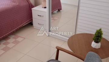 Квартира 1+1 с мебелью в районе Оба, всего в 250 метрах от моря — отличное предложение для жизни и инвестиций - Ракурс 16