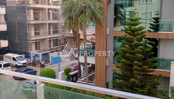 Квартира 1+1 с мебелью в районе Оба, всего в 250 метрах от моря — отличное предложение для жизни и инвестиций - Ракурс 19