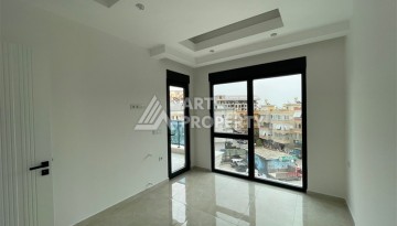 Квартира 1+1 в новом комплексе премиум-класса в центре Аланьи, всего в 800 метрах от моря - Ракурс 6