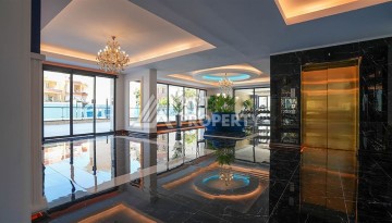 Квартира 1+1 в новом комплексе премиум-класса в центре Аланьи, всего в 800 метрах от моря - Ракурс 18