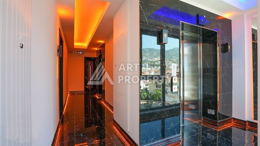 Квартира 1+1 в новом комплексе премиум-класса в центре Аланьи, всего в 800 метрах от моря - Ракурс 19