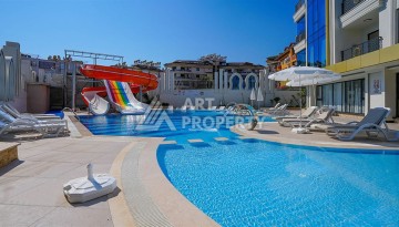 Квартира 1+1 в новом комплексе премиум-класса в центре Аланьи, всего в 800 метрах от моря - Ракурс 24