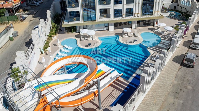 Квартира 1+1 в новом комплексе премиум-класса в центре Аланьи, всего в 800 метрах от моря - Ракурс 26