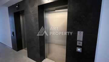 Квартира в новом комплексе 2025 года с отельной инфраструктурой в районе пляжа Клеопатра, Аланья - Ракурс 4