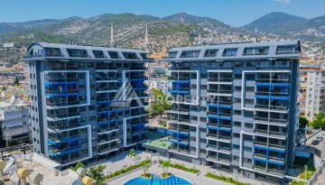 Современная квартира 1+1 в 600 м от пляжа Клеопатры. Новая резиденция в центре Алании - Ракурс 2