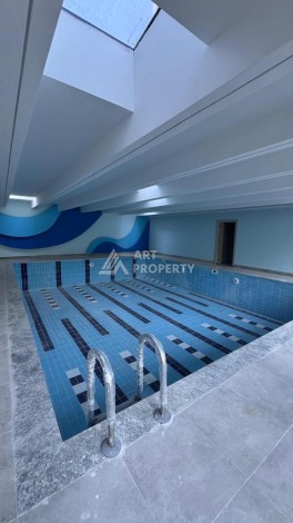 Современная квартира 1+1 в 600 м от пляжа Клеопатры. Новая резиденция в центре Алании - Ракурс 8