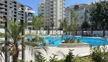 Современная квартира 1+1 в 600 м от пляжа Клеопатры. Новая резиденция в центре Алании - Ракурс 10