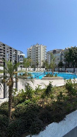 Современная квартира 1+1 в 600 м от пляжа Клеопатры. Новая резиденция в центре Алании - Ракурс 9