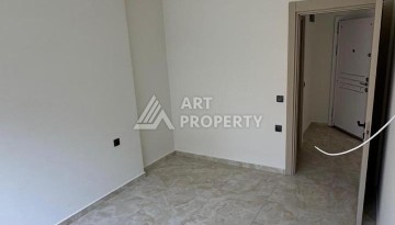 Современная квартира 1+1 в 600 м от пляжа Клеопатры. Новая резиденция в центре Алании - Ракурс 14