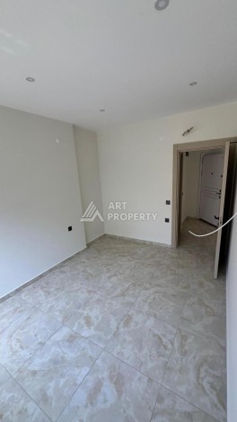 Современная квартира 1+1 в 600 м от пляжа Клеопатры. Новая резиденция в центре Алании - Ракурс 13