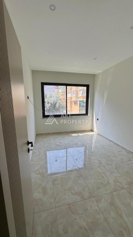 Современная квартира 1+1 в 600 м от пляжа Клеопатры. Новая резиденция в центре Алании - Ракурс 14